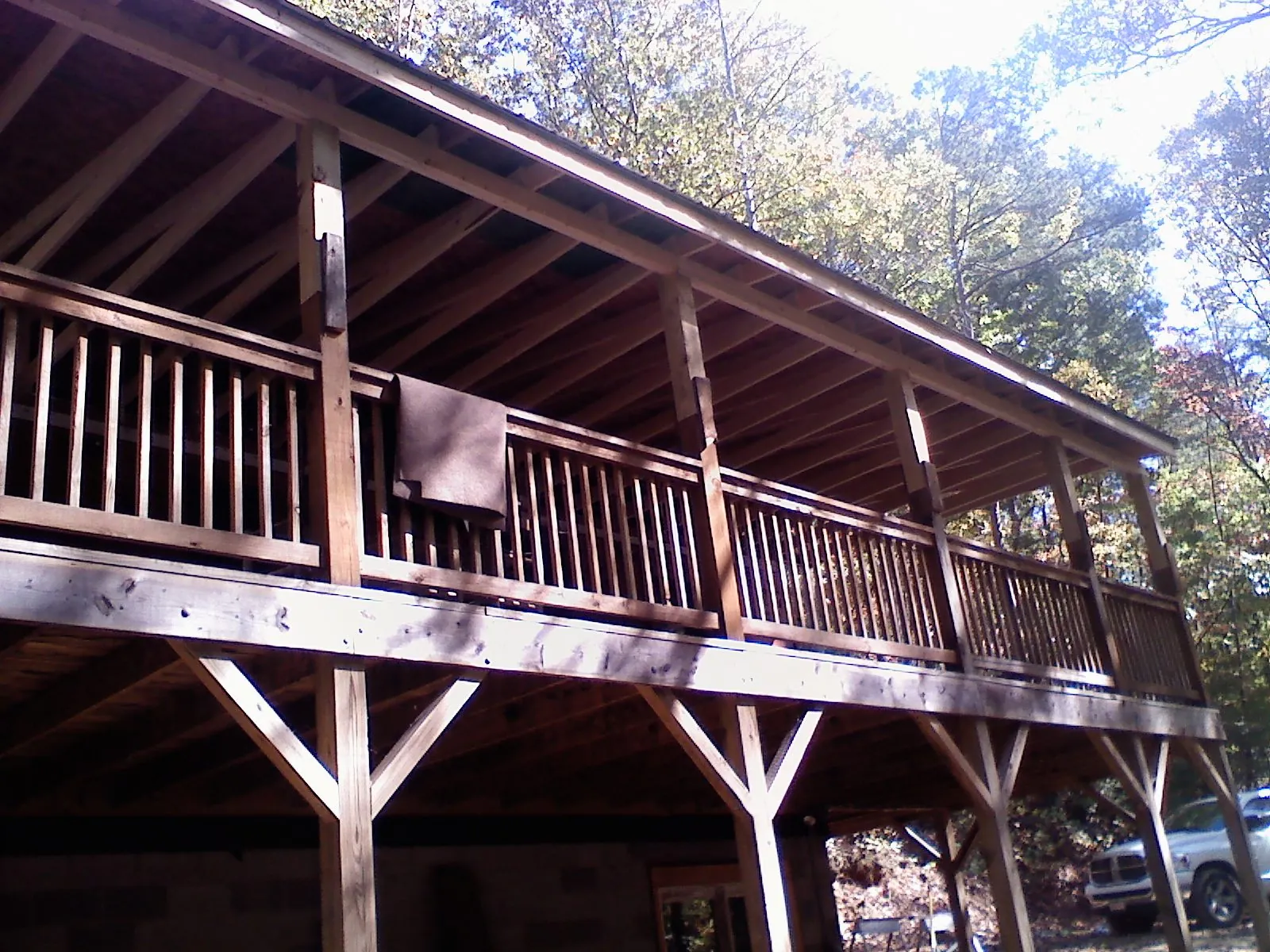 Timber framing under a new elevated porch and deck — Roof Leak Repair in Baldwin Place by Roofing Brothers